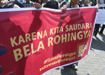 Indonesian students protest in support of the Rohingya community in Solo, Central Java, May 15, 2020.
