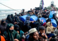 Newly-arrived Rohingya refugees are held on their boat after authorities prevented them from disembarking at Leuge Beach in Indonesia’s Aceh province in January (Cek Mad/AFP via Getty Images)