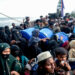 Newly-arrived Rohingya refugees are held on their boat after authorities prevented them from disembarking at Leuge Beach in Indonesia’s Aceh province in January (Cek Mad/AFP via Getty Images)