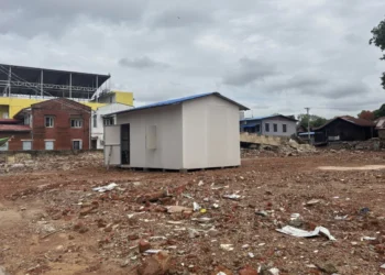 A temporary building is seen after clear collapsed building caused by strong earthquake in Naypyitaw, Myanmar, Friday, May 23, 2025. (AP Photo/Aung Shine Oo)